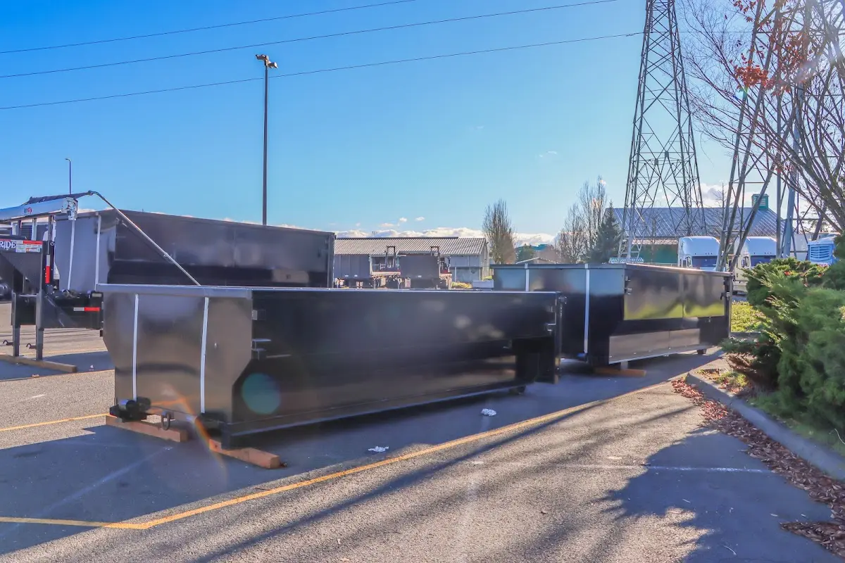 Roll-off dumpster ready for waste disposal at job site for Roll Off Dumpster Rental in Merrimac